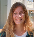 A person smiling for the cameraDescription automatically generated with medium confidence